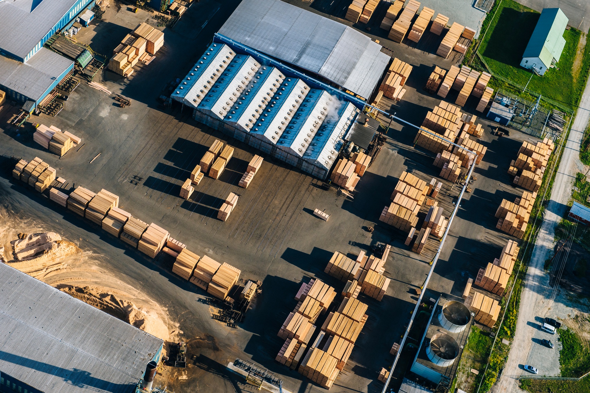 Aerial view of stacked planks in timber yard